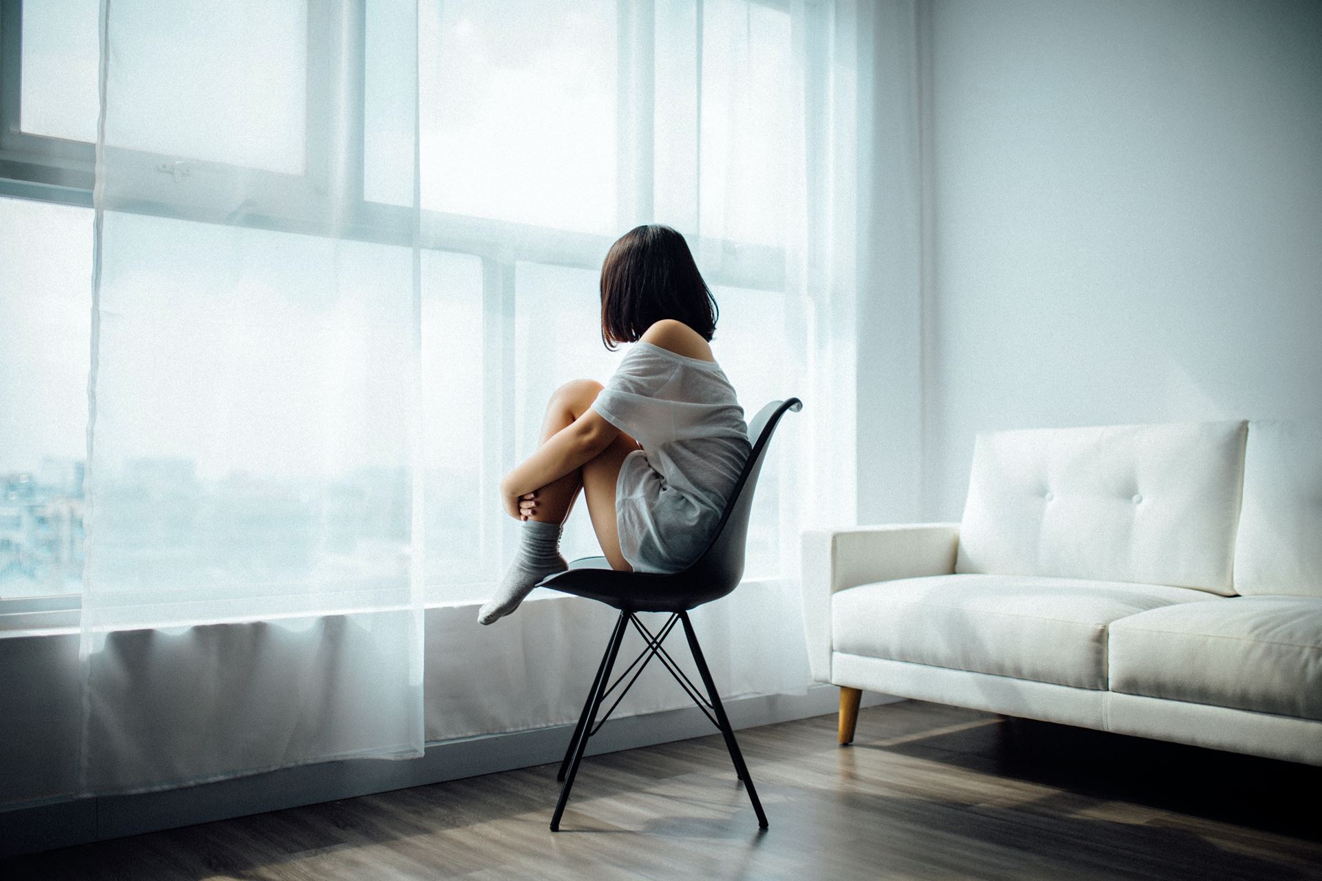 a woman alone on a chair